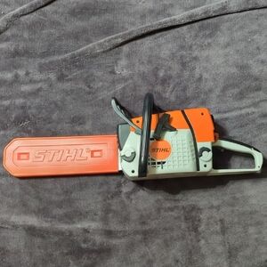 STIHL Toy Chainsaw with Orange and Gray Colors